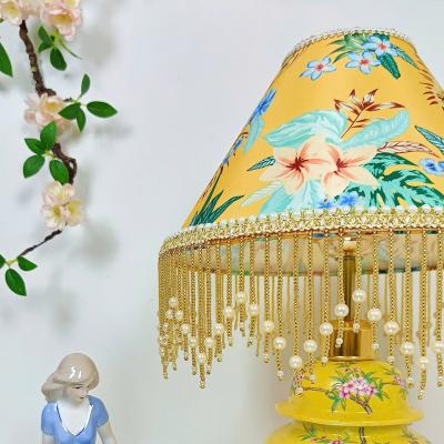 ĐÈN BÀN THIẾT KẾ – MEN VÀNG HỌA TIẾT CHIM TRĨ